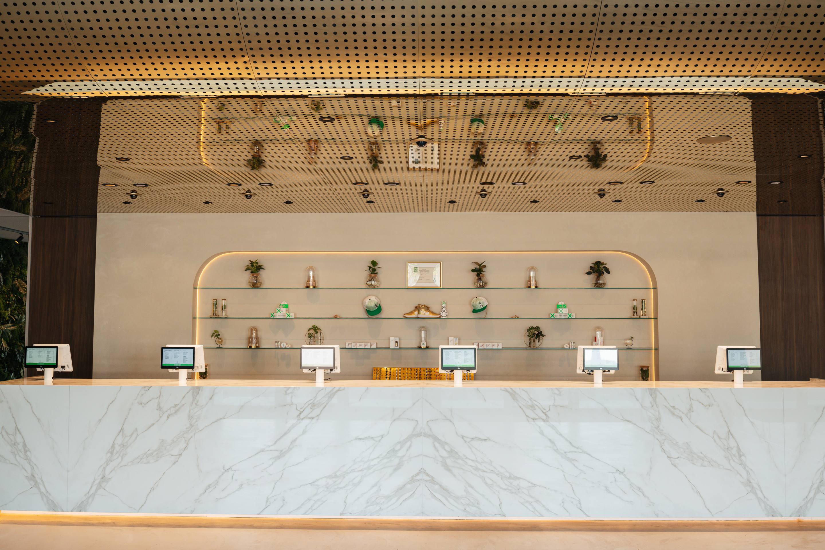 De Loods Amersfoort marble service counter and backlit product niche